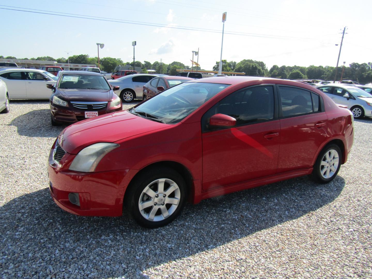 2012 Red /Gray Nissan Sentra 2.0 (3N1AB6AP4CL) with an 2.0L L4 DOHC 16V engine, Automatic transmission, located at 15016 S Hwy 231, Midland City, AL, 36350, (334) 983-3001, 31.306210, -85.495277 - Photo#2